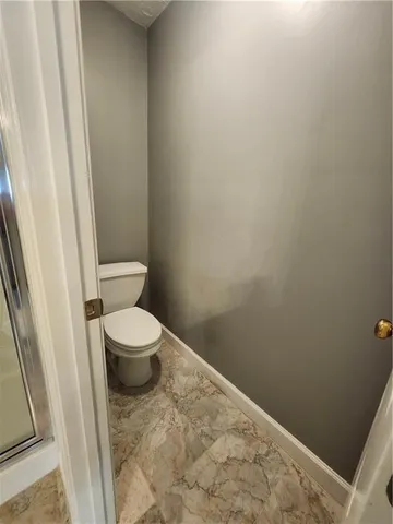 a view of a swimming pool with an outdoor space and seating area