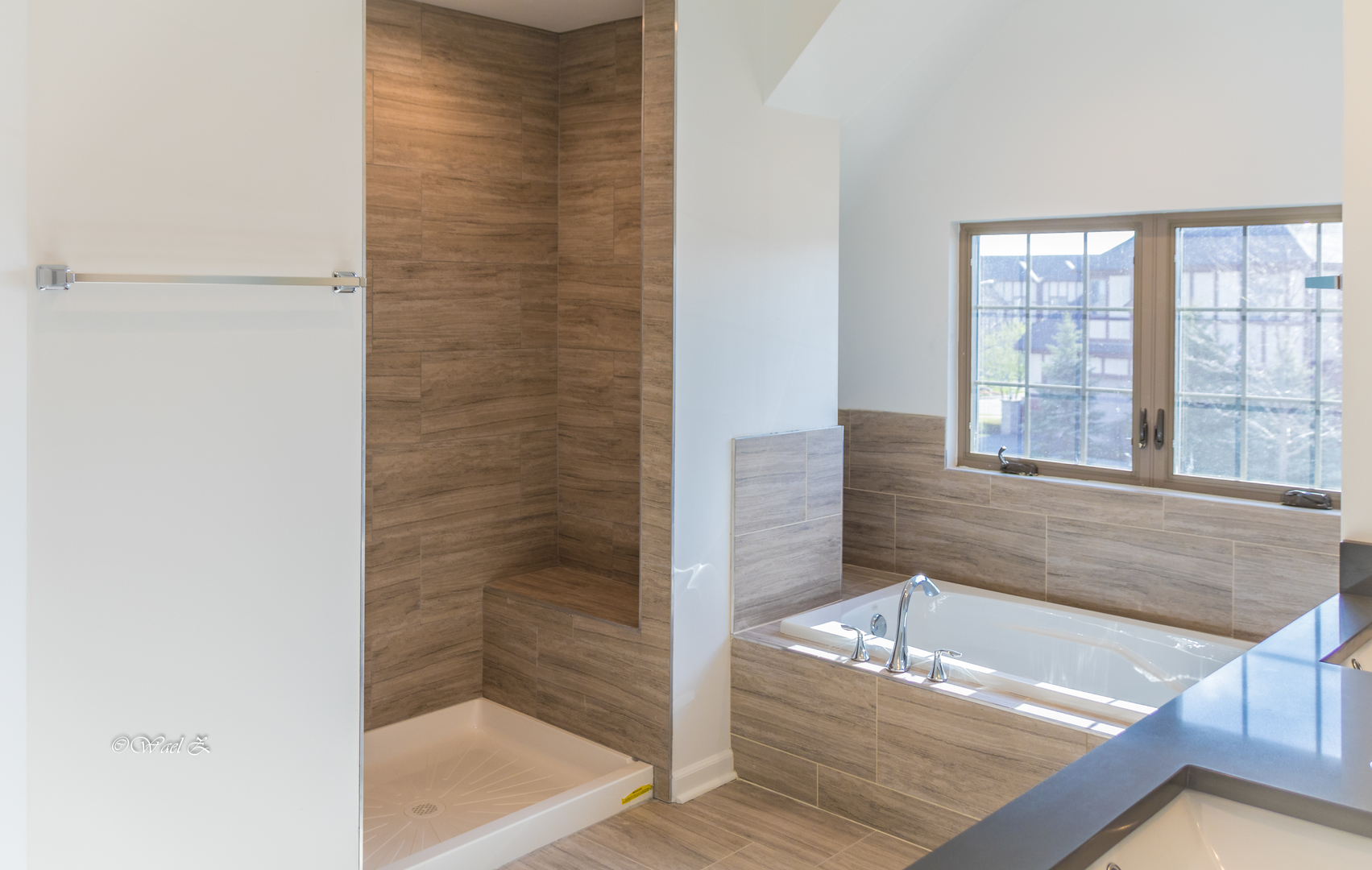 12728 Wild Rye Court, Unit B Plainfield, IL 60585 - Photo 18 of 21 a bathroom with a bathtub and shower