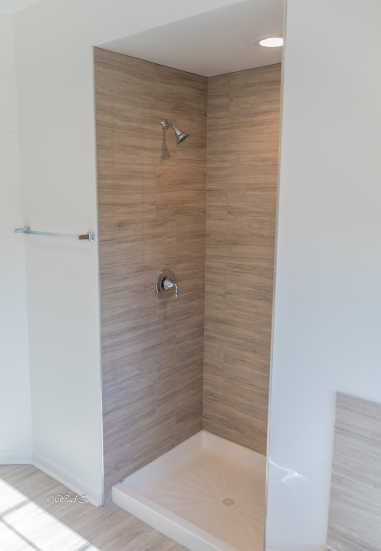 12728 Wild Rye Court, Unit B Plainfield, IL 60585 - Photo 21 of 21 a bathroom with a shower