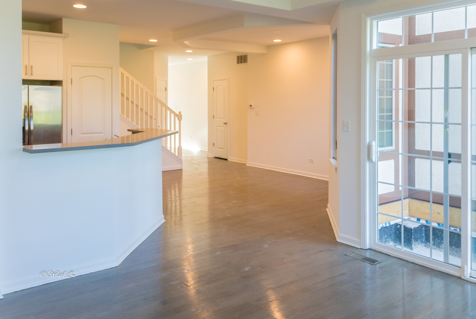 12728 Wild Rye Court, Unit B Plainfield, IL 60585 - Photo 8 of 21 a view of an entryway with wooden floor