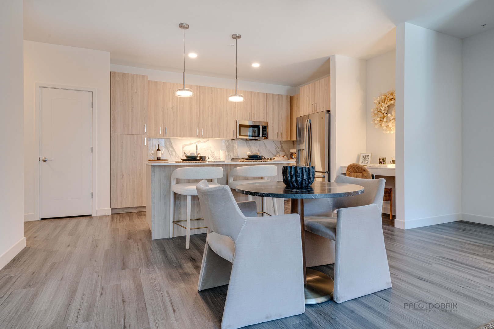 750 Hawthorn Row, Unit 1115 Vernon Hills, IL 60061 - Photo 13 of 24 a view of kitchen with cabinets and wooden floor