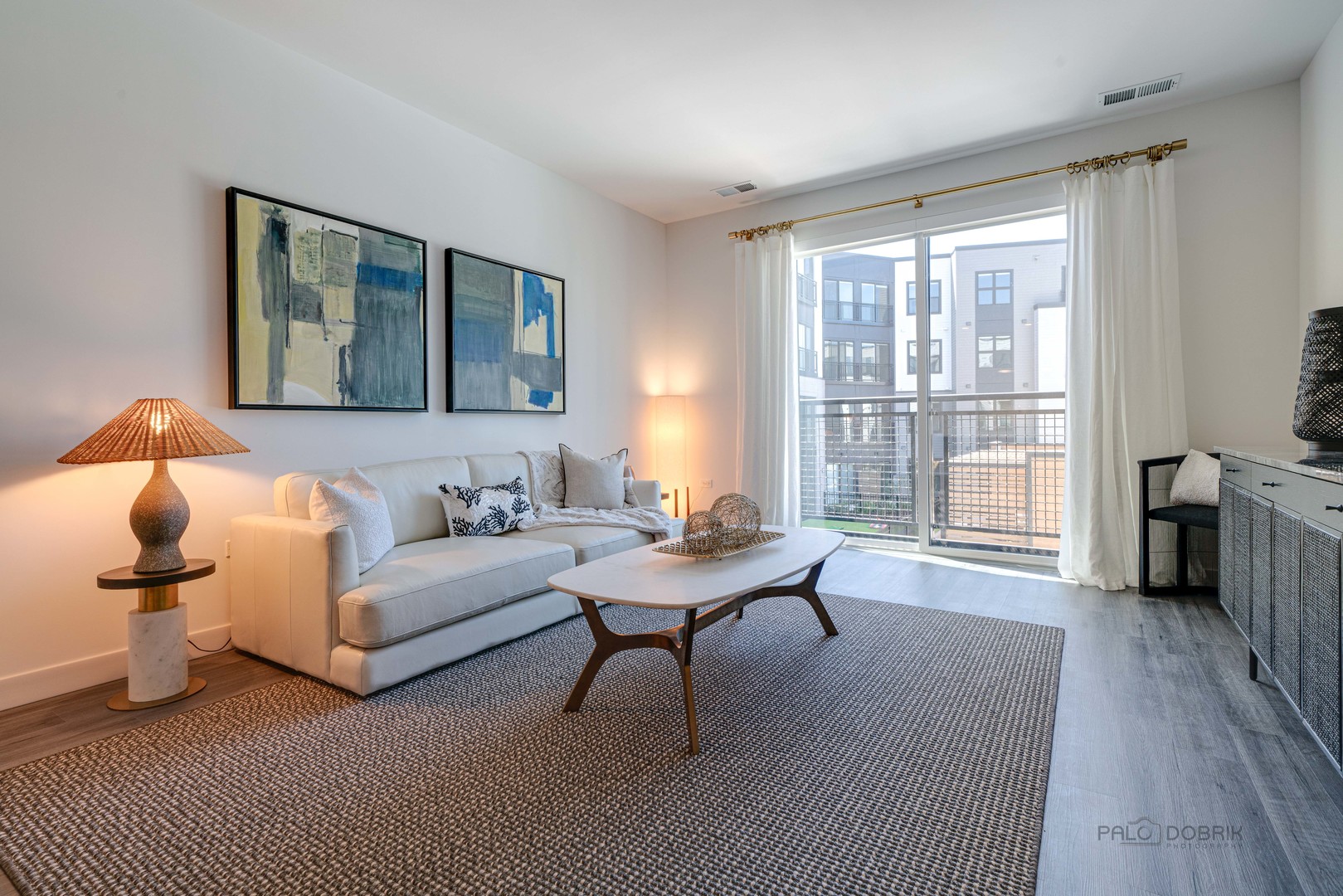 750 Hawthorn Row, Unit 1115 Vernon Hills, IL 60061 - Photo 14 of 24 a living room with furniture and a window