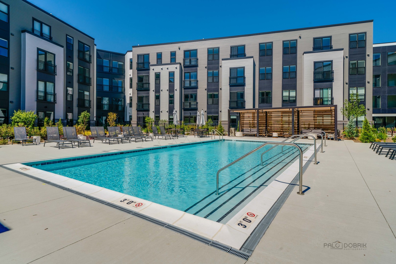 750 Hawthorn Row, Unit 1115 Vernon Hills, IL 60061 - Photo 23 of 24 a view of swimming pool with outdoor seating