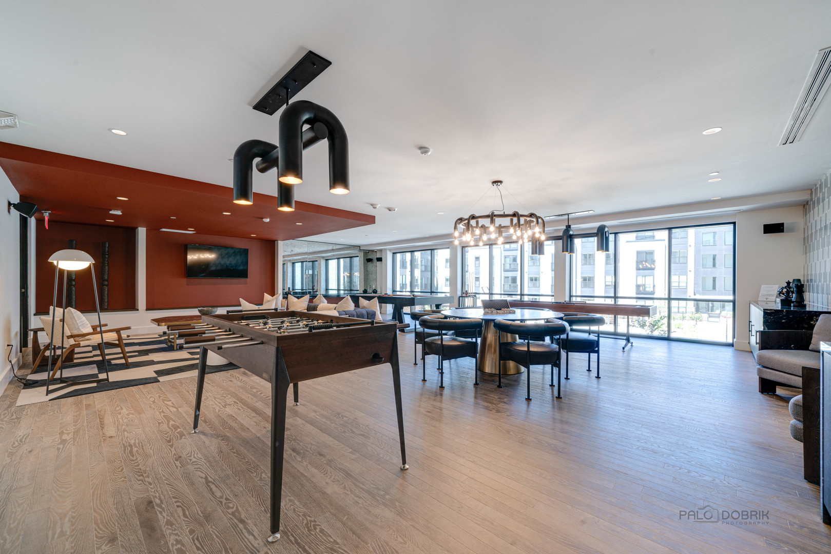 750 Hawthorn Row, Unit 1115 Vernon Hills, IL 60061 - Photo 9 of 24 a view of a dining room with furniture and wooden floor
