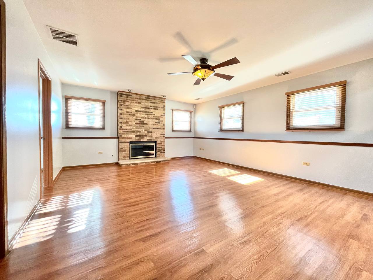 1689 Apple Valley Road Bolingbrook, IL 60490 - Photo 18 of 28 a view of a livingroom with a flat screen tv