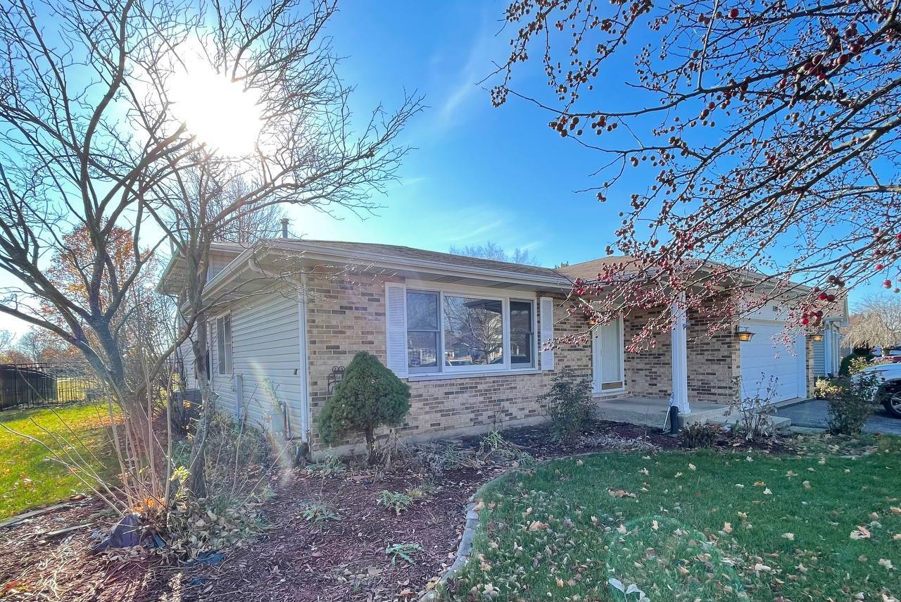 1689 Apple Valley Road Bolingbrook, IL 60490 - Photo 2 of 28 a view of a house with a yard