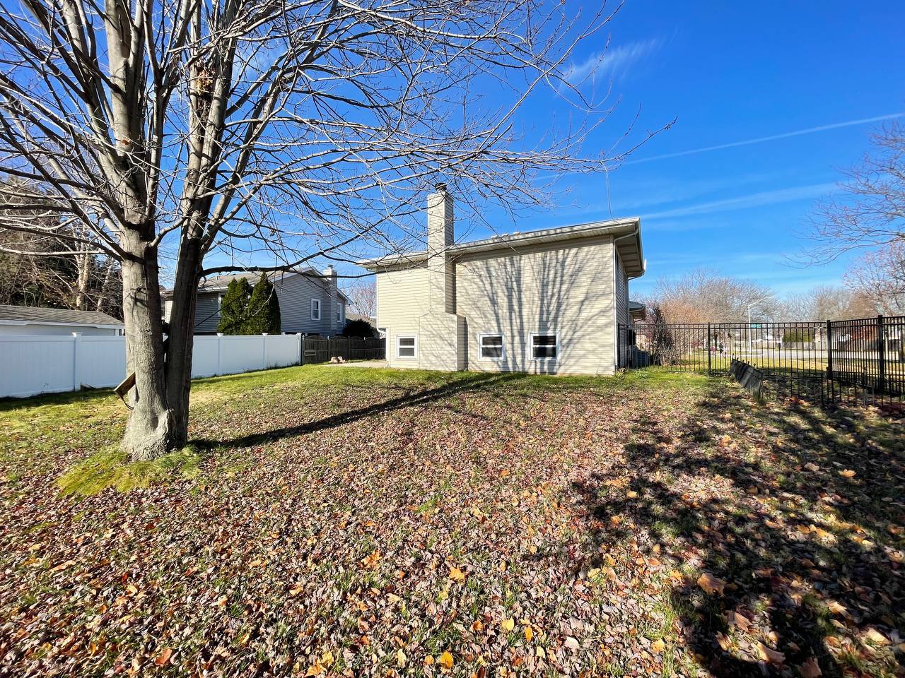 1689 Apple Valley Road Bolingbrook, IL 60490 - Photo 26 of 28 a view of a house with a yard