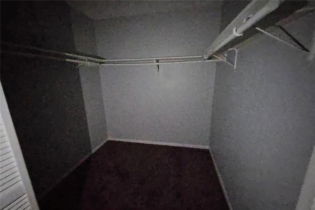 3575 Oakvale Road, Unit 420 Decatur, GA 30034 - Photo 12 of 13 a view of a room with racks on the wall