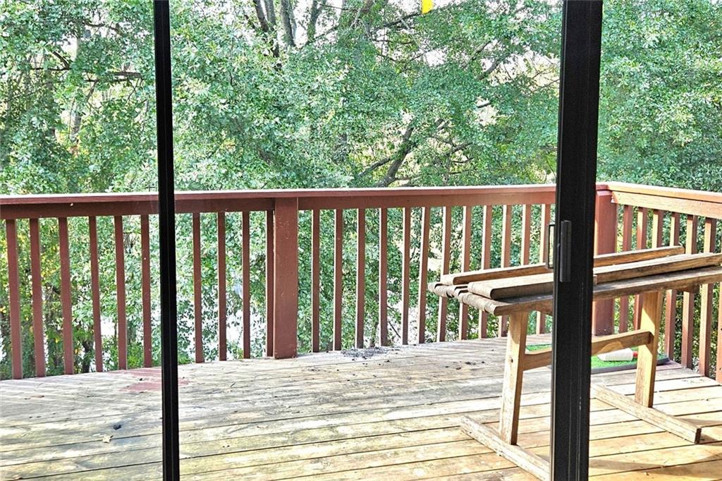 3575 Oakvale Road, Unit 420 Decatur, GA 30034 - Photo 4 of 13 a view of a balcony with wooden floor