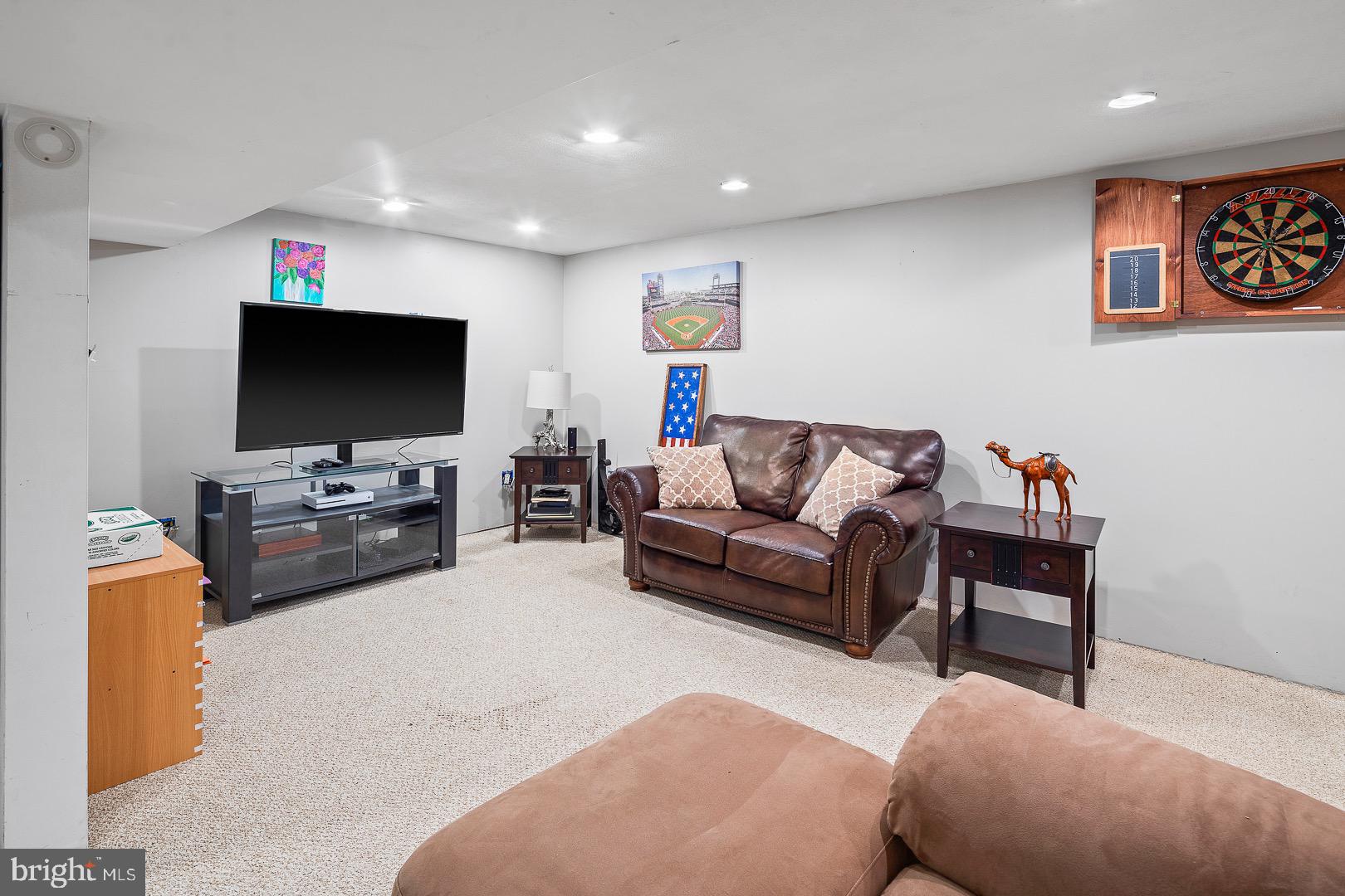 45 Pasadena Drive Hamilton, NJ 08619 - Photo 22 of 34 Semi-finished basement includes a family room