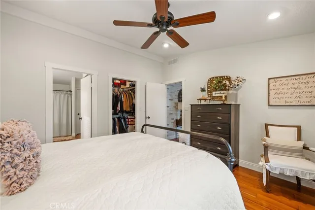 a bed room with a bed and a window