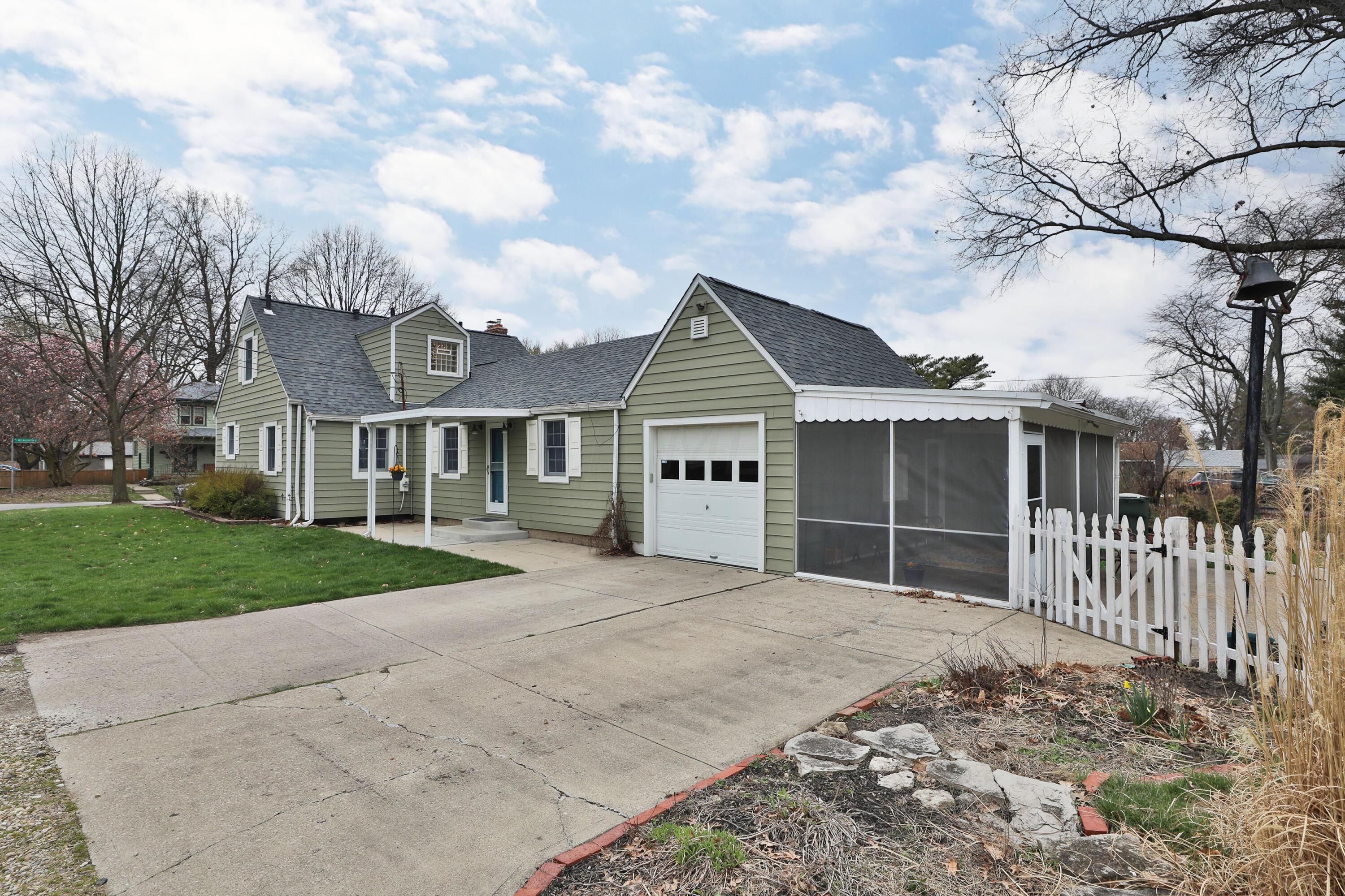 390 East Beaumont Road Columbus, OH 43214 - Photo 51 of 52 Attached garage with driveway
