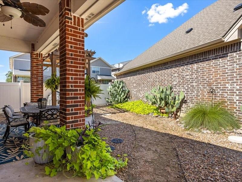 3510 Fountain Way Granbury, TX 76049 - Photo 20 of 27 View of yard with ceiling fan and a patio