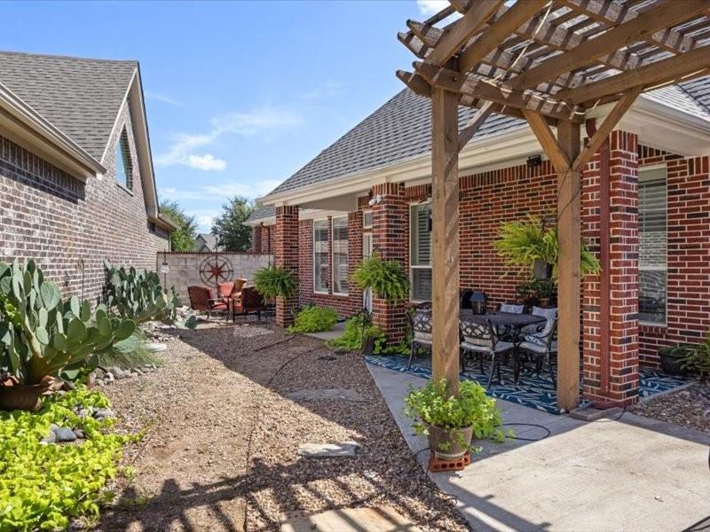 3510 Fountain Way Granbury, TX 76049 - Photo 22 of 27 View of yard with a patio and a pergola