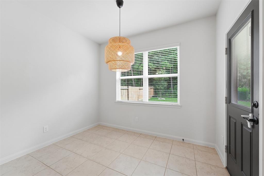7707 Boulder Sunstone Lane Conroe, TX 77304 - Photo 11 of 26