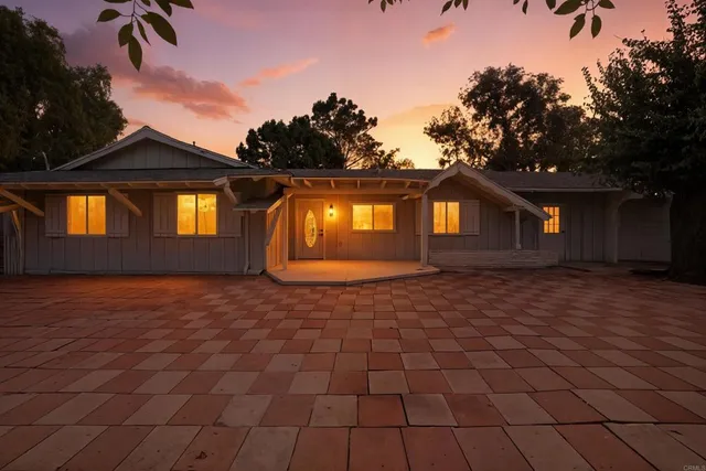 a view of backyard of a house