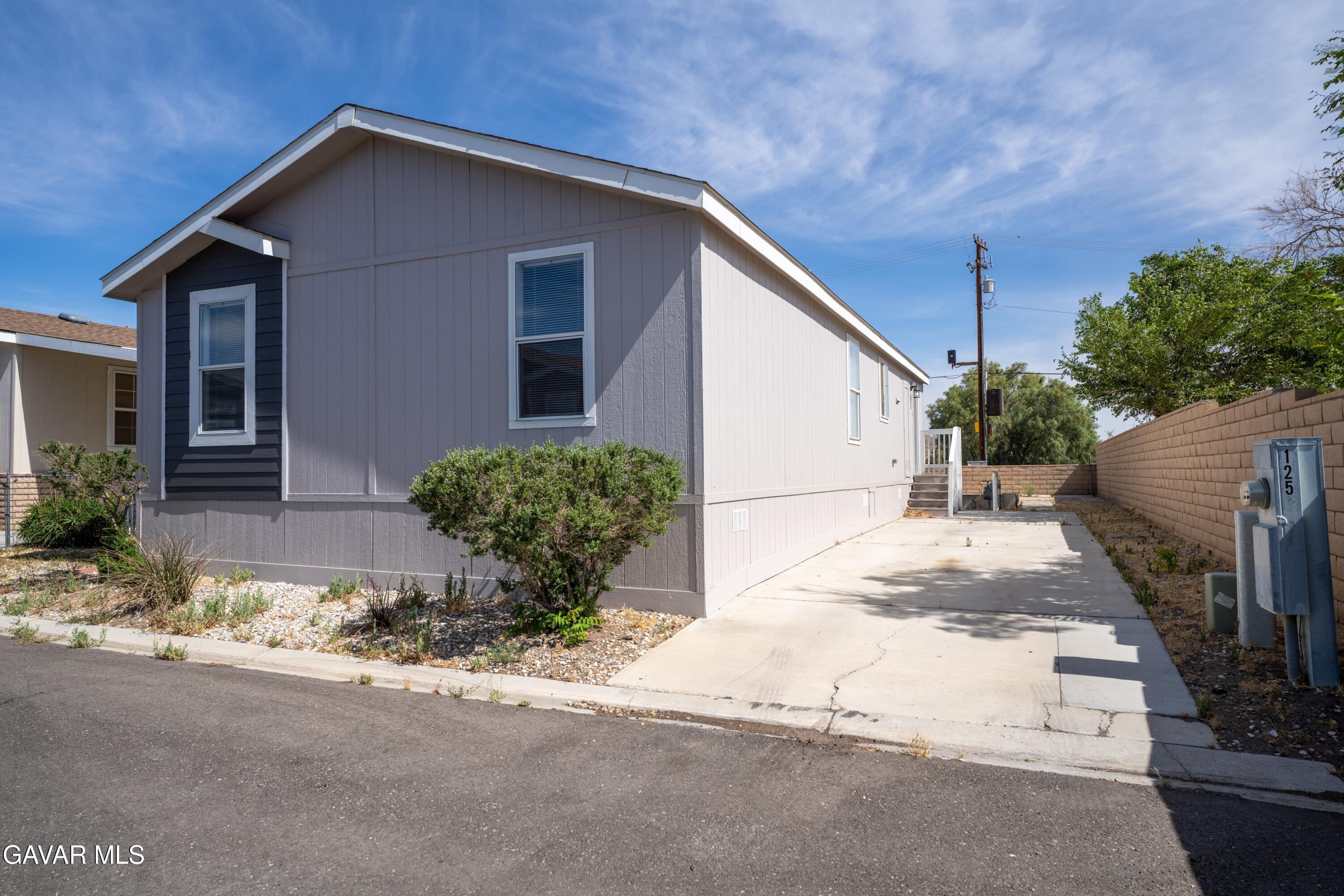 a front view of house with yard