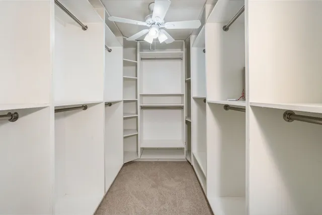 a view of an empty walk in closet