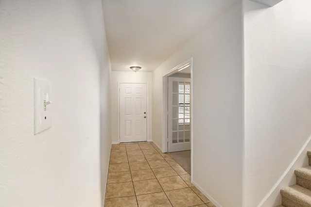 a view of a room with windows