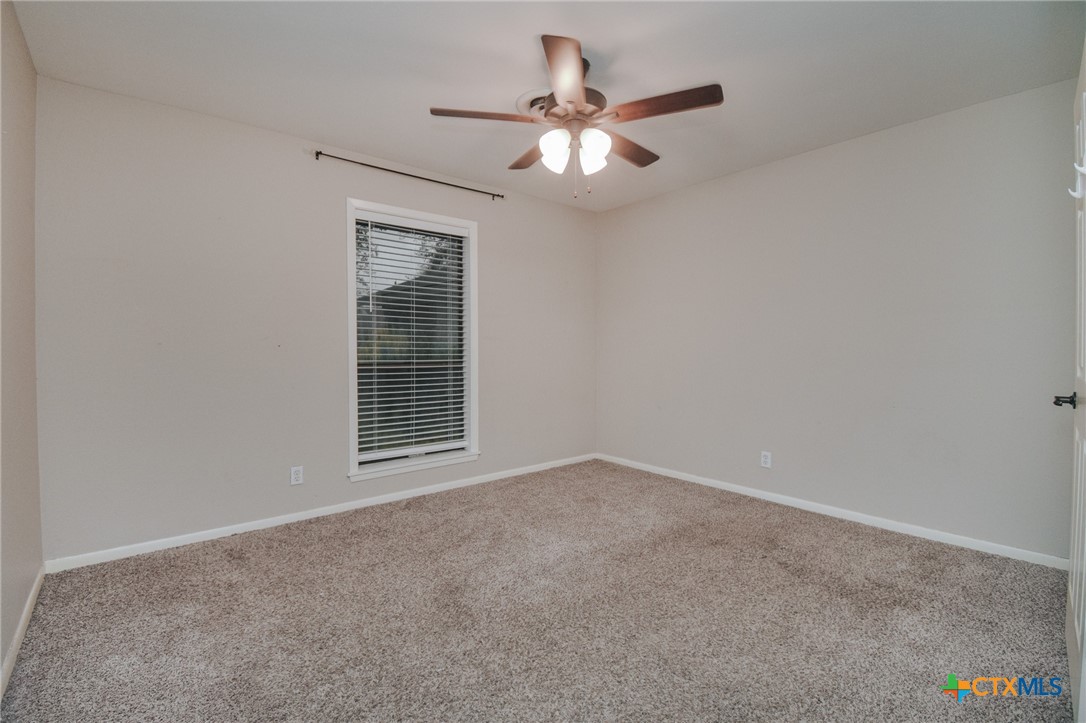 115 Santa Fe Victoria, TX 77904 - Photo 16 of 17 a view of an empty room with a window