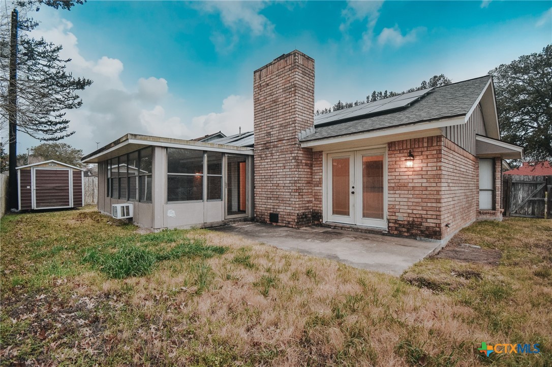 115 Santa Fe Victoria, TX 77904 - Photo 5 of 17 a front view of a house with a garden