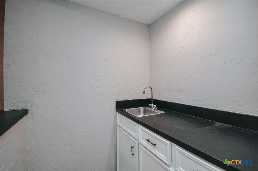 115 Santa Fe Victoria, TX 77904 - Photo 9 of 17 a close view of sink and tap