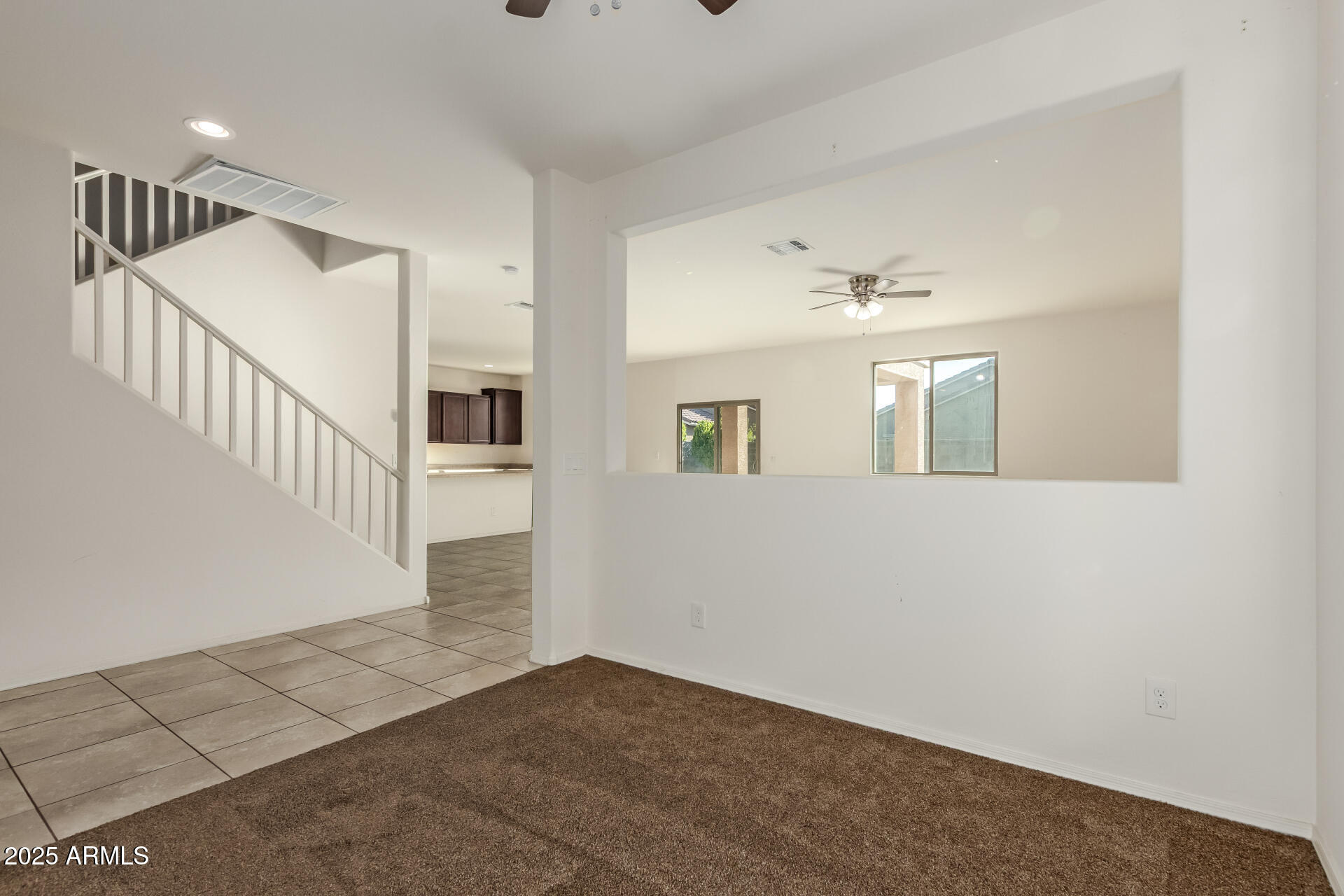 11603 West Calavar Road El Mirage, AZ 85335 - Photo 7 of 38 a view of an entryway with wooden floor