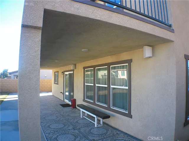 a view of a hallway with entryway