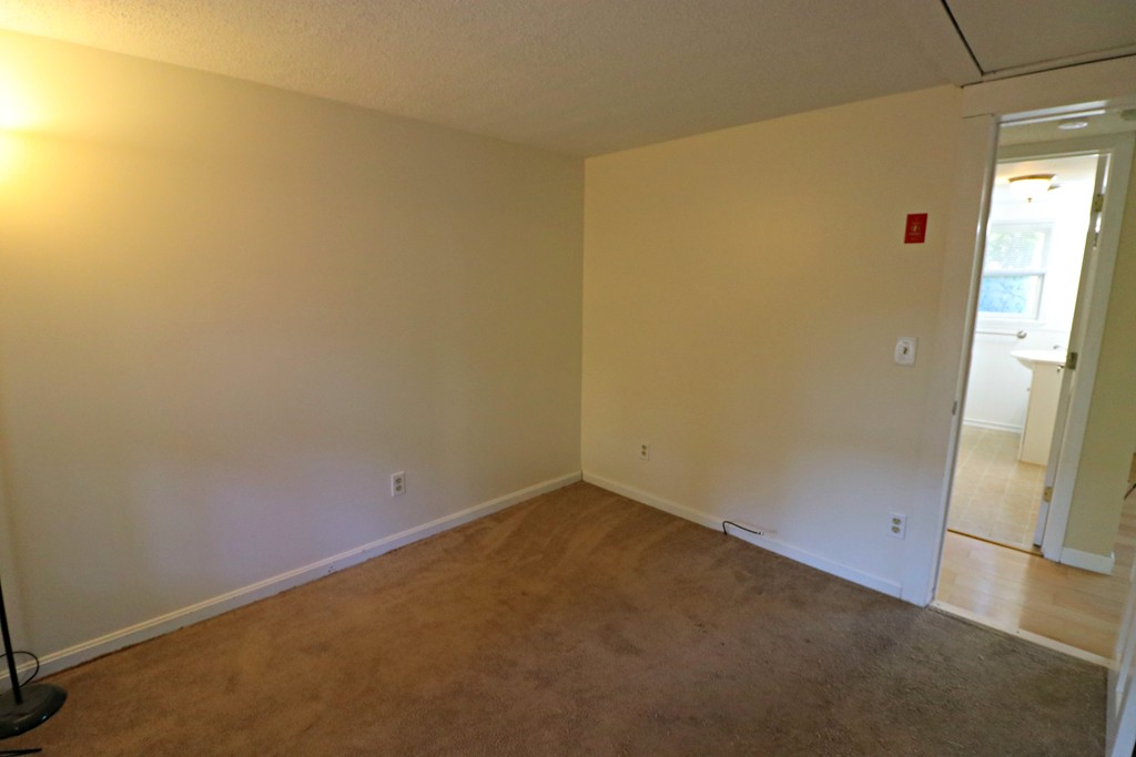 471 Plumtree Road Springfield, MA 01118 - Photo 10 of 15 an empty room with windows