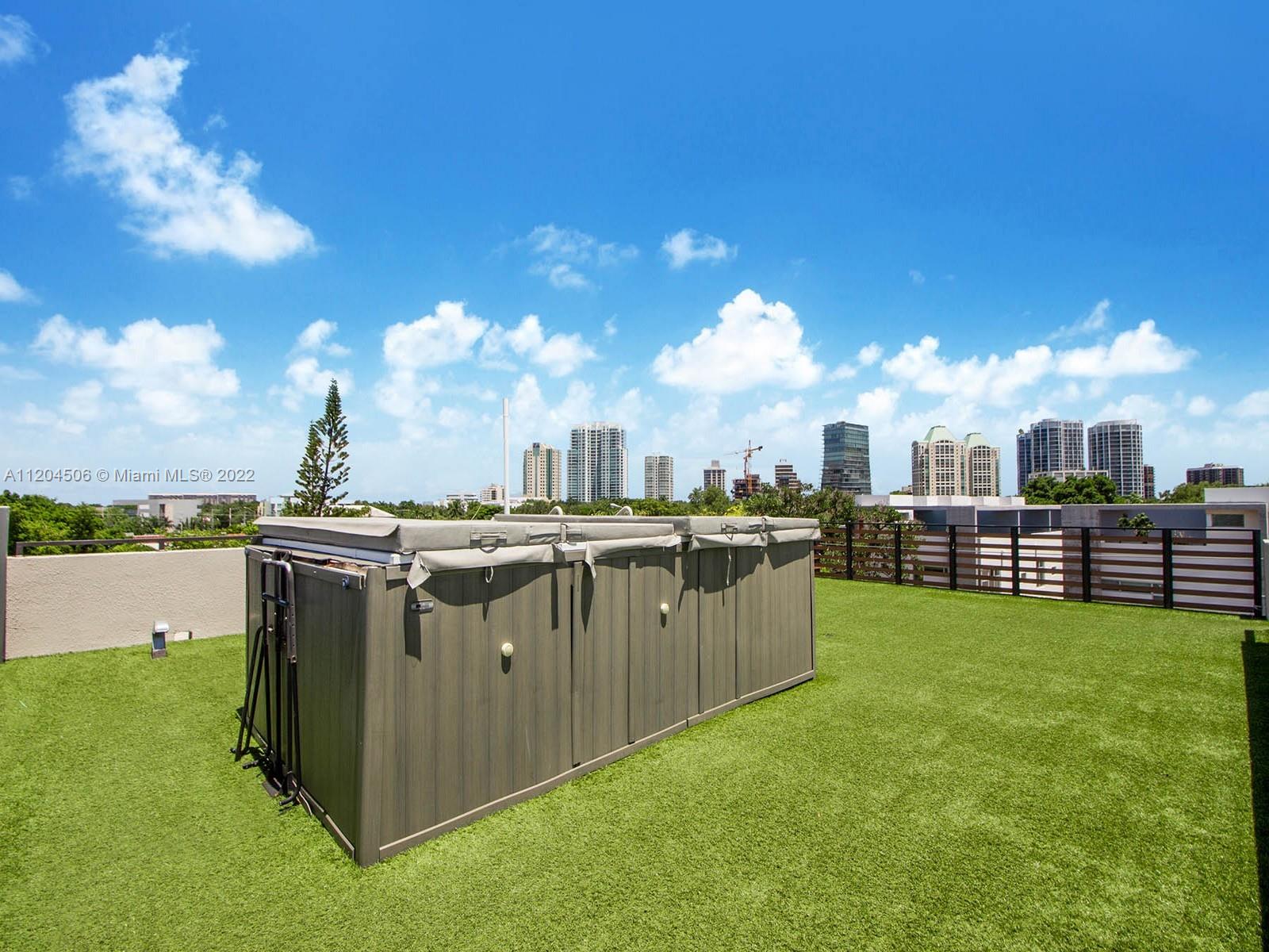 2955 Bird Avenue, Unit PHA Miami, FL 33133 - Photo 28 of 33 a view of a city with lots of green space