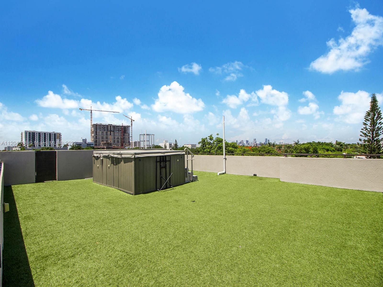 2955 Bird Avenue, Unit PHA Miami, FL 33133 - Photo 29 of 33 a view of a lake with a terrace