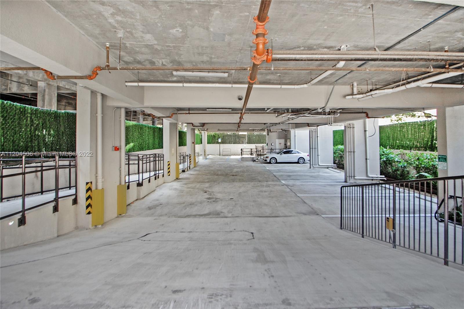 2955 Bird Avenue, Unit PHA Miami, FL 33133 - Photo 30 of 33 a view of a garage with wooden floor