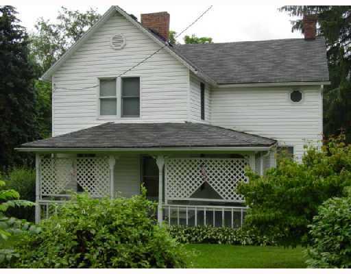 Exterior Front. Charming country farmhouse on 2.4 scenic acres!
