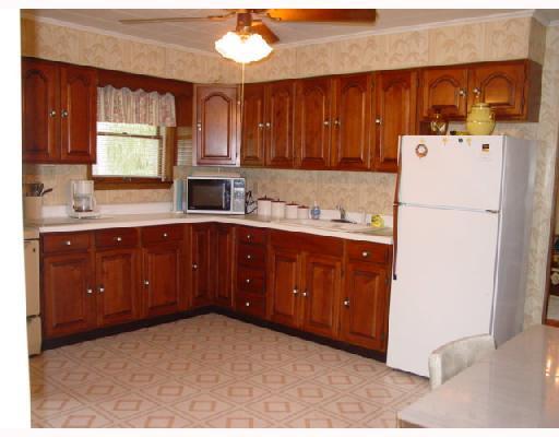 120 Greenfield Road Perryopolis, PA 15473 - Photo 4 of 8 Kitchen. Beautiful cherry cabinetry looks oh-so-special in the large eat-in-kitchen!