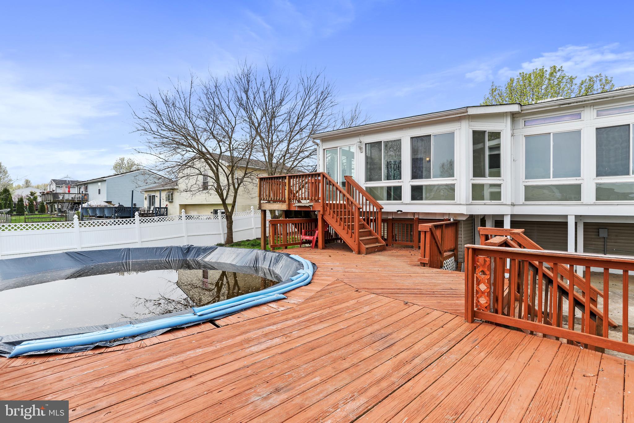 235 Roth Avenue Taneytown, MD 21787 - Photo 37 of 42 Sun Room, Deck and Pool