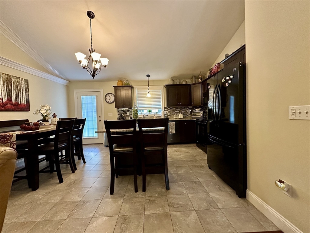 115 Bronson Fall River Fall River, MA 02724 - Photo 16 of 37 a view of a dining room with furniture