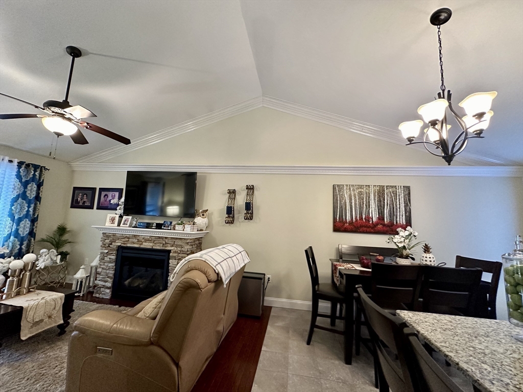 115 Bronson Fall River Fall River, MA 02724 - Photo 19 of 37 a view of a dining room with furniture and a chandelier