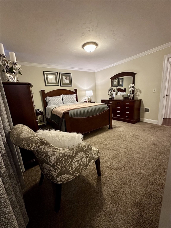 115 Bronson Fall River Fall River, MA 02724 - Photo 23 of 37 a bed room with furniture and a couch