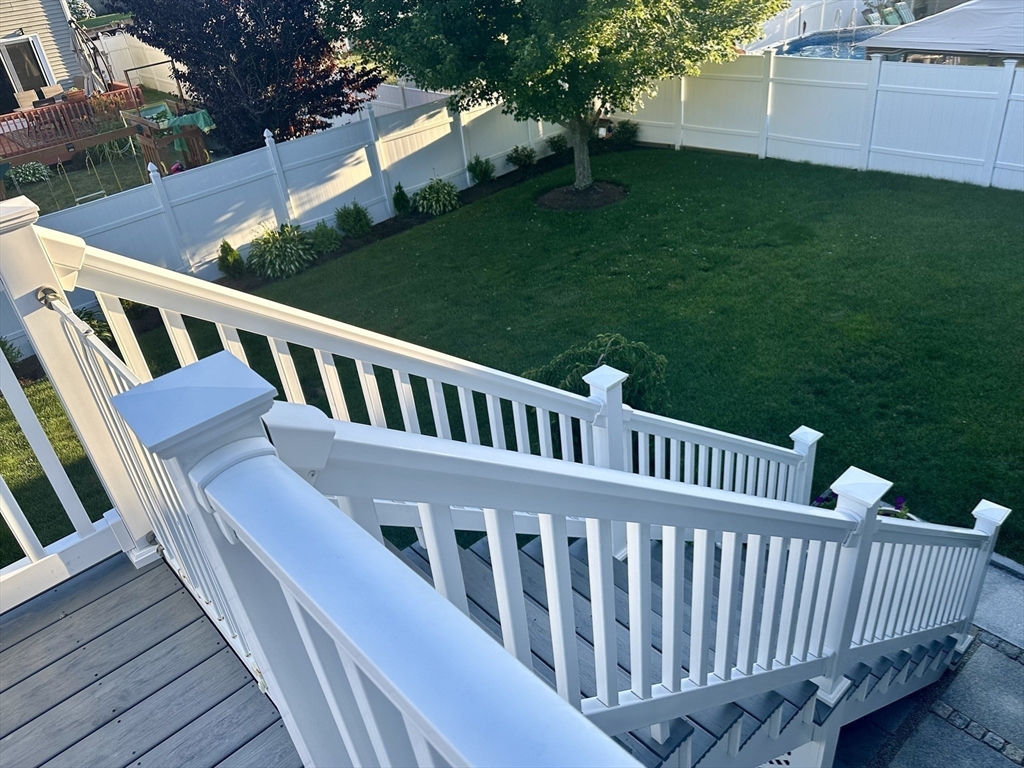 115 Bronson Fall River Fall River, MA 02724 - Photo 35 of 37 a view of a deck with a yard
