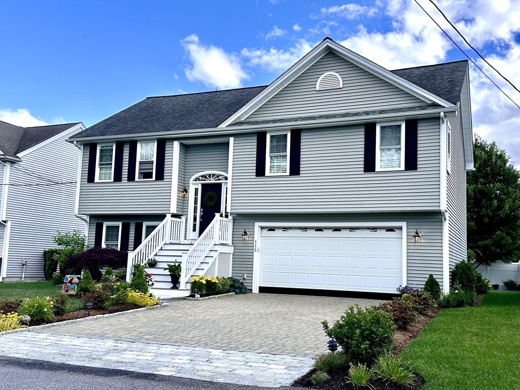 115 Bronson Fall River Fall River, MA 02724 - Photo 37 of 37 a front view of a house with garden