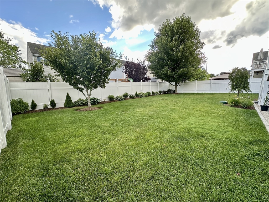 115 Bronson Fall River Fall River, MA 02724 - Photo 8 of 37 a view of yard with green space