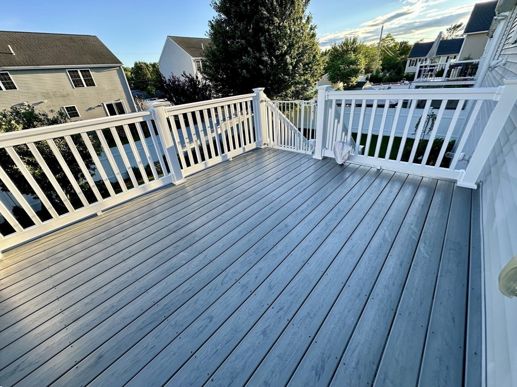115 Bronson Fall River Fall River, MA 02724 - Photo 9 of 37 a view of balcony with wooden floor
