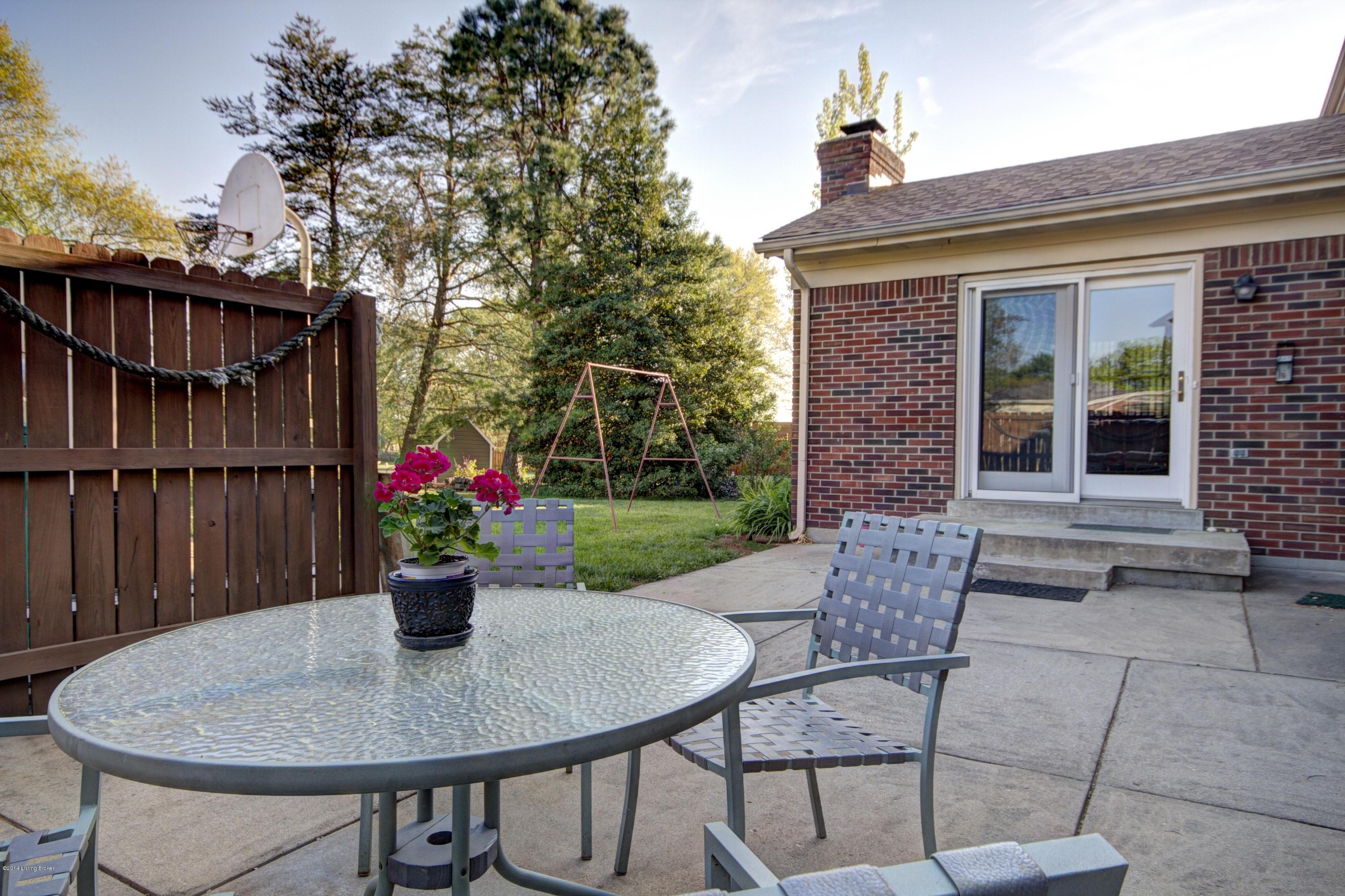 7602 Tempsclair Road Louisville, KY 40220 - Photo 34 of 44 Patio to the yard. Perfectly private for a hot tub.