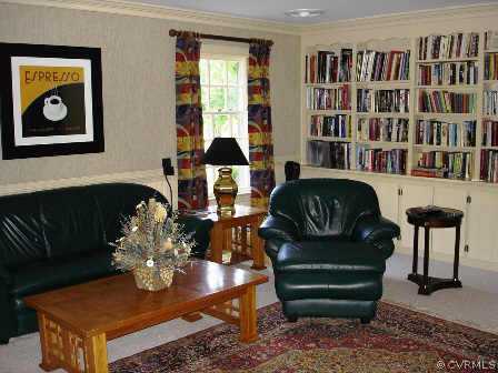 13601 Elmstead Road Midlothian, VA 23113 - Photo 5 of 10 a living room with furniture and a bookshelf