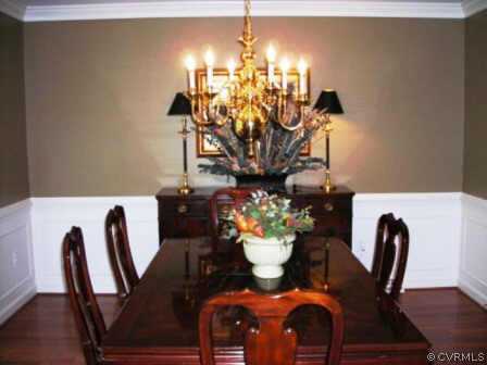 13601 Elmstead Road Midlothian, VA 23113 - Photo 10 of 10 a view of a dining room with furniture and chandelier