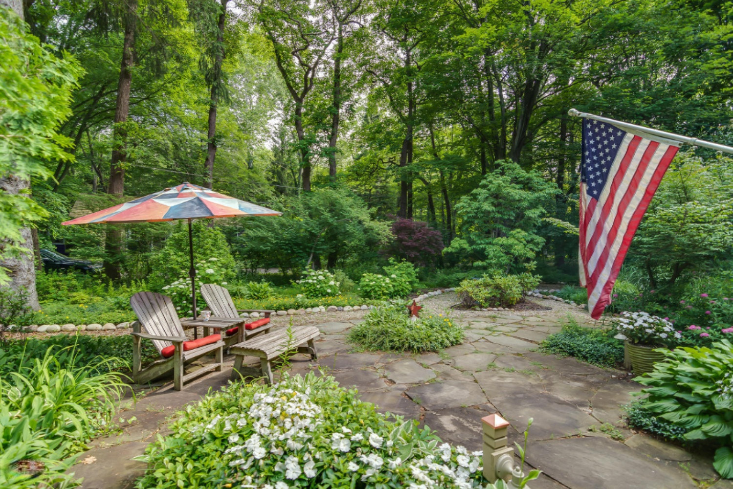 7292 Spring Avenue Harbert, MI 49115 - Photo 8 of 42 Stone patio in the front yard
