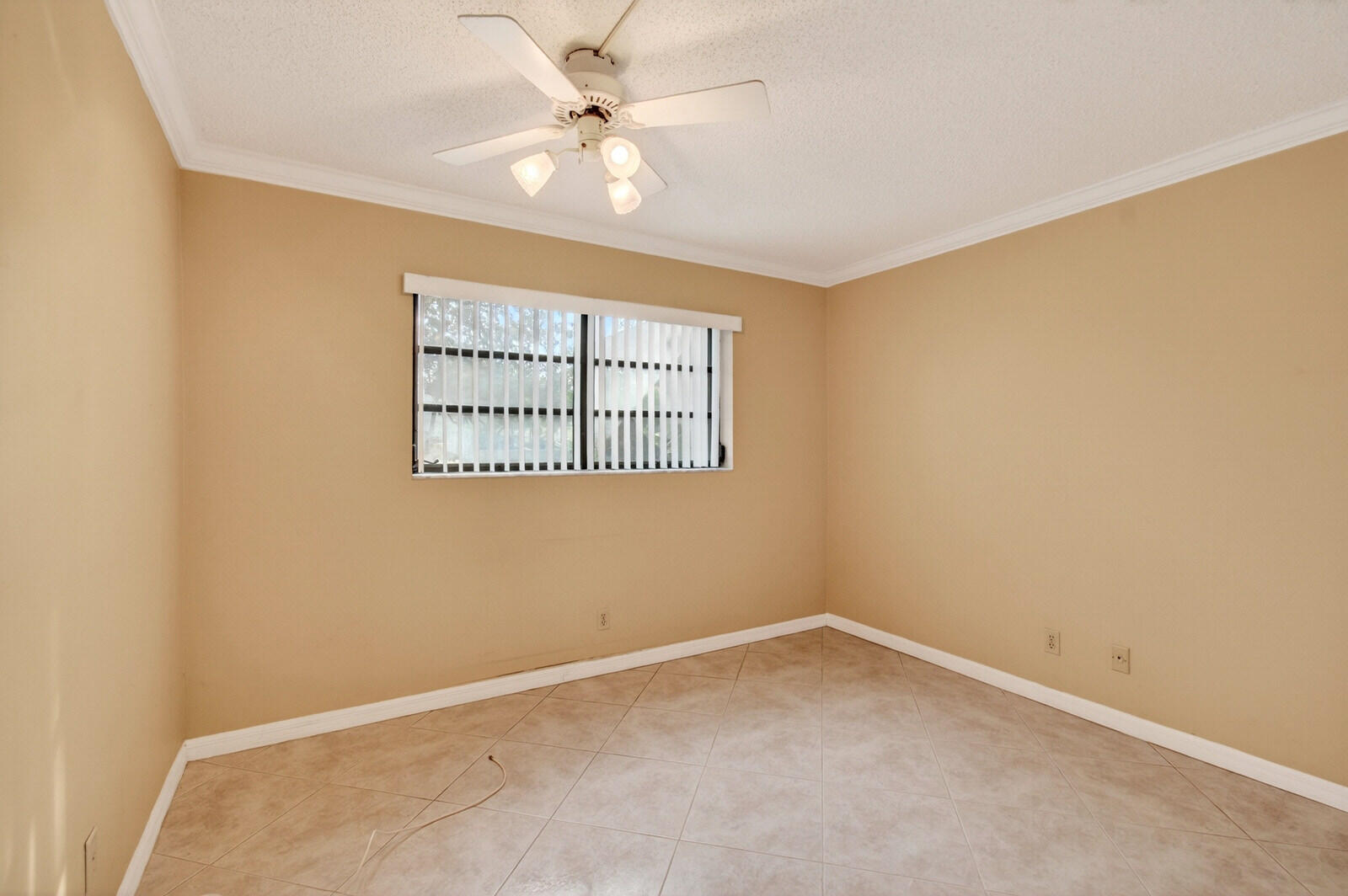 3951 Northeast 19th Road, Unit 1701 Pompano Beach, FL 33064 - Photo 41 of 82 an empty room with a ceiling fan and a window