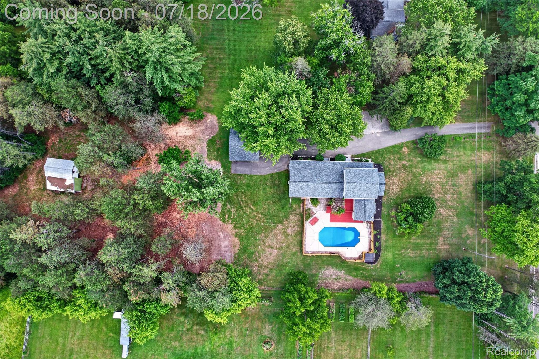 1437 East Cook Road Grand Blanc, MI 48439 - Photo 28 of 69 Aerial perspective showcasing a property surrounded by mature trees