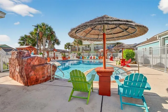 a view of a house with a yard from a balcony