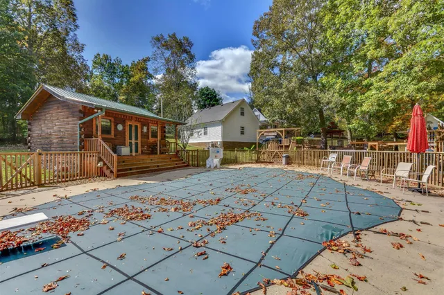 a kitchen with stainless steel appliances granite countertop a refrigerator and a stove